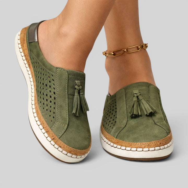 Comfortable women's slip-on walking shoes with elegant tassel detail, offering superb arch support.