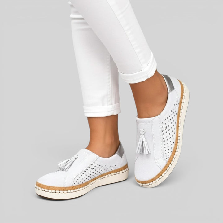 Breathable women's slip-on casual shoes, designed for everyday comfort and supportive walking.
