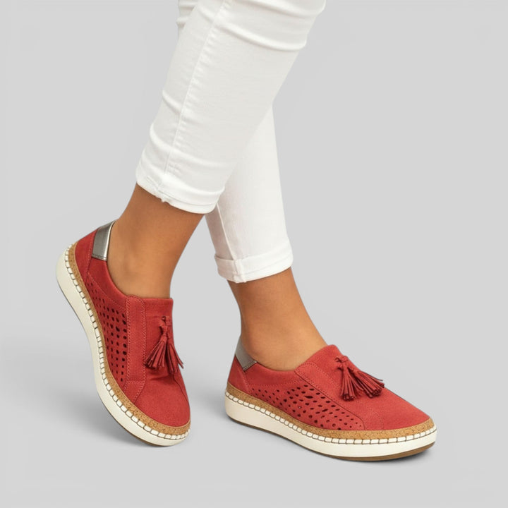 Fashionable women's slip-on flats, combining everyday comfort with essential support for active lifestyles.