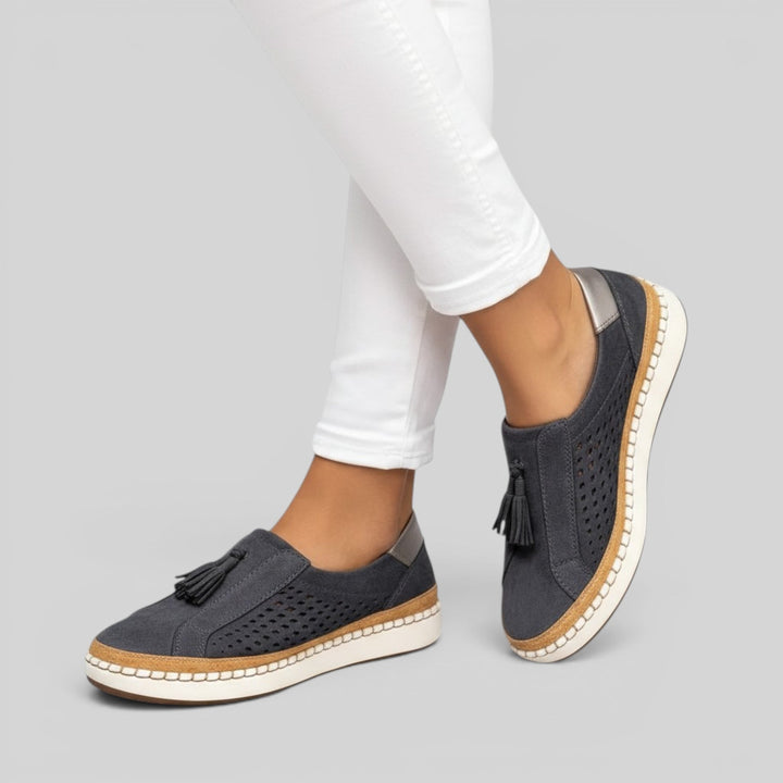Casual women's slip-on flats, providing breathable comfort and support for daily errands and light walks.