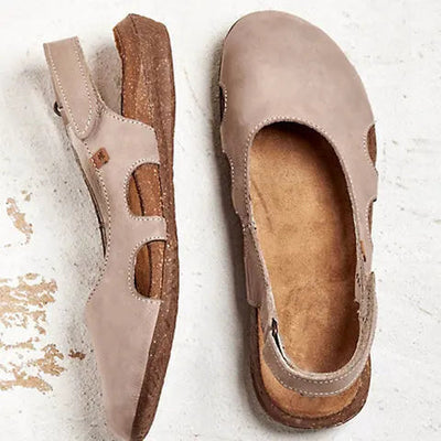 Supportive women's walking sandals with arch support & adjustable straps; ideal comfortable summer footwear.