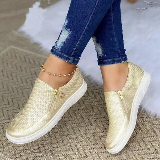 Supportive women's zip-up orthopedic footwear, offering comfort and relief for everyday walking.