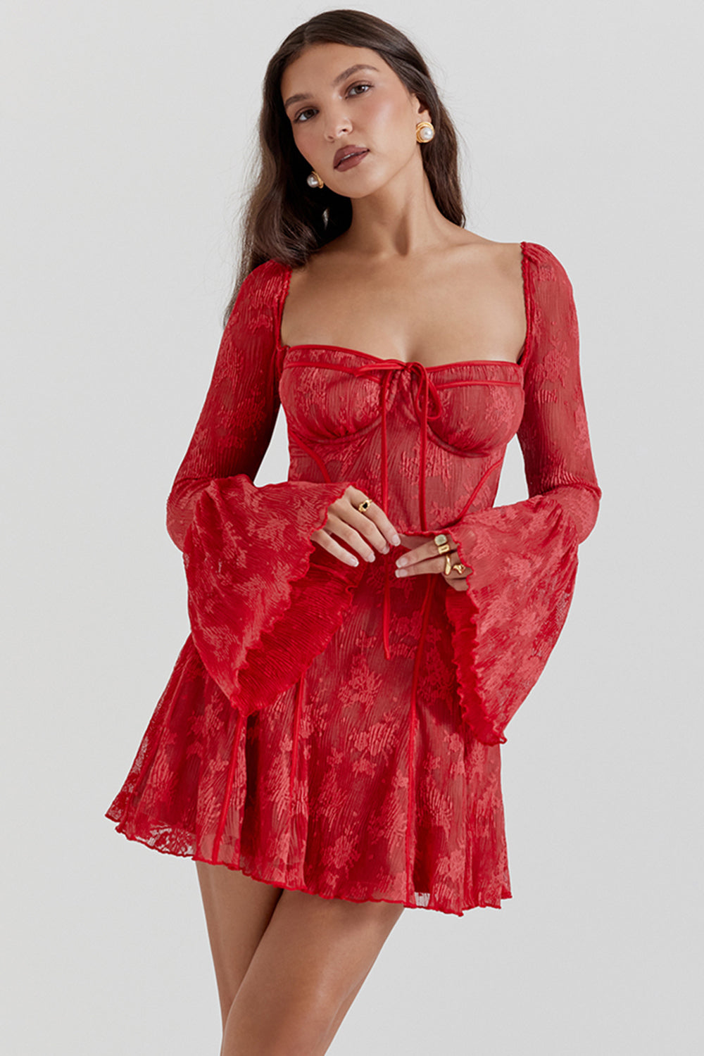 Chic women's mini party dress with a flattering sweetheart neckline and flowy bell sleeves.