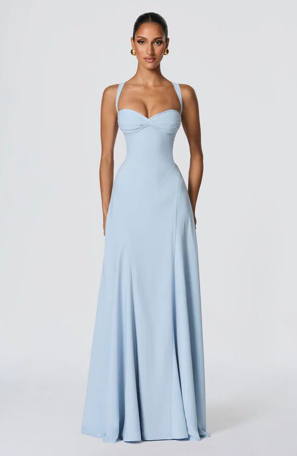 Stylish women's long maxi dress with sweetheart neckline, flowing fabric, for formal wedding guests.