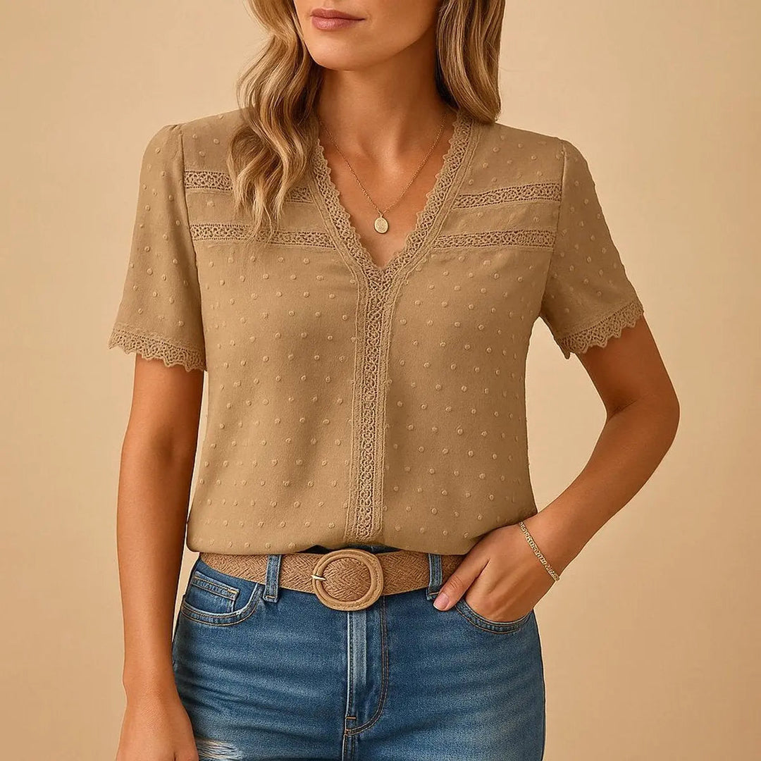Women's Swiss Dot V-Neck Blouse with delicate lace trim, short sleeves. Elegant and feminine summer top.