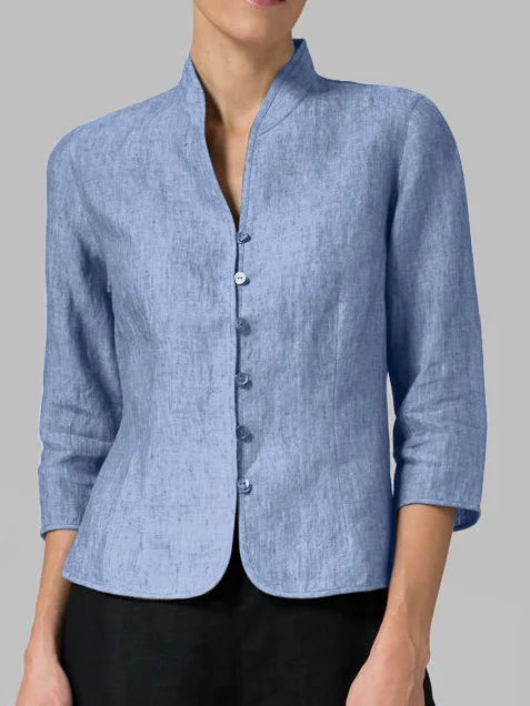 Women's tailored 3/4 sleeve button-front jacket with elegant mandarin collar. Chic and versatile outerwear.