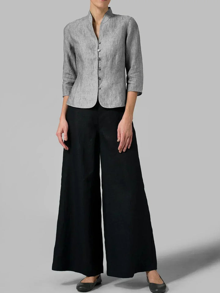 Women's jacket with 3/4 sleeves, button-front closure, and sophisticated mandarin collar. Tailored fit for spring.