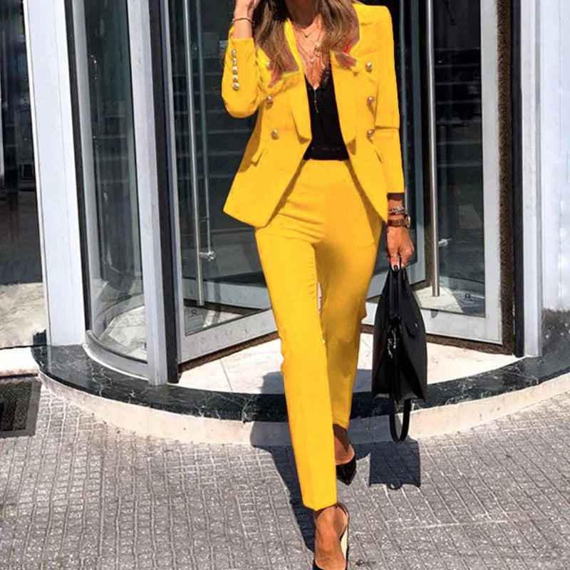 Women's tailored blazer and trousers set in a professional, chic style, perfect for business attire or formal wear.