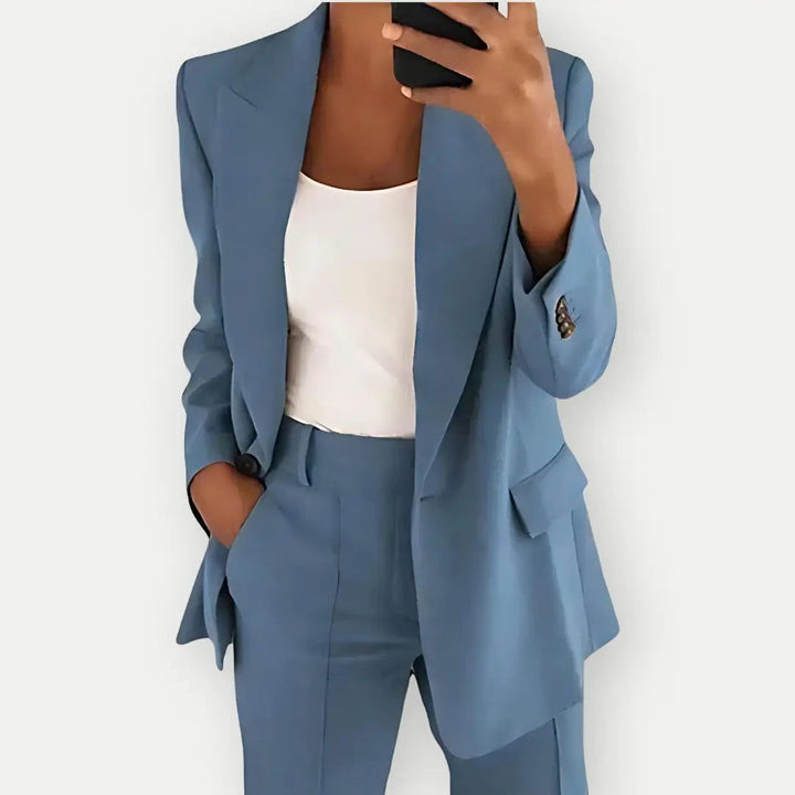 Sophisticated women's tailored suit, blazer and trousers offering a professional and fashionable workwear option.