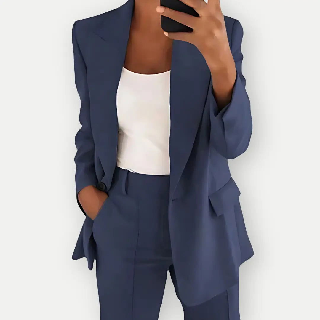 Versatile women's professional outfit: a chic tailored blazer and comfortable trousers for daily workwear.
