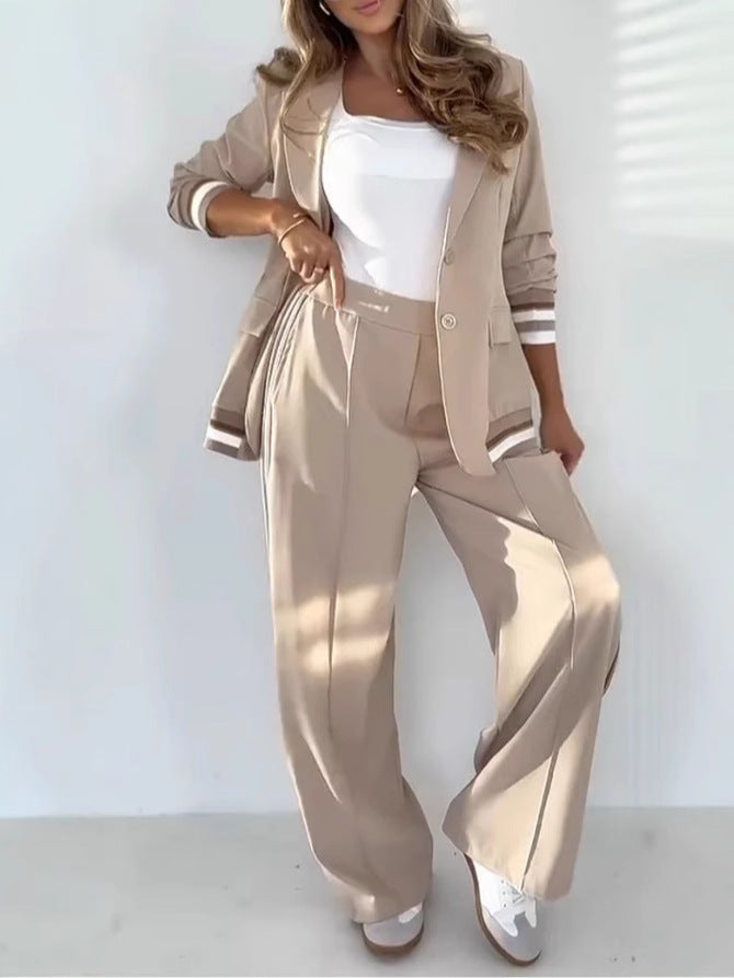 Women's tailored co-ord set with sporty blazer and wide-leg trousers, perfect for smart casual looks.