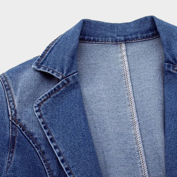 Effortless smart-casual women's denim blazer. Tailored long-sleeve jacket, great for spring, autumn, & versatile style.