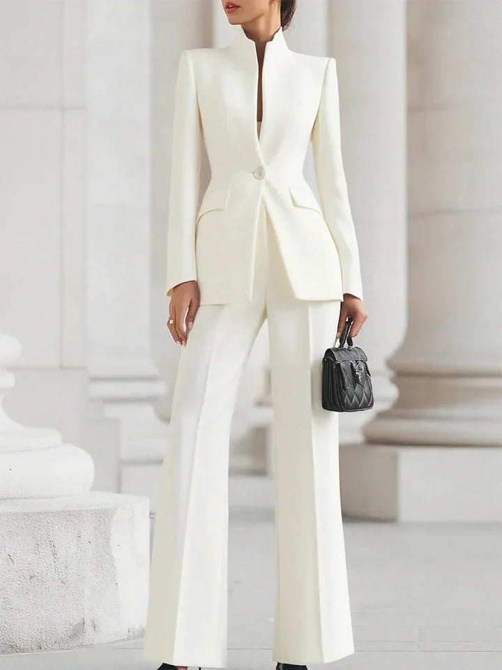 Stylish women's flared denim trousers. Casual chic jeanswear, paired with a matching tailored jacket.