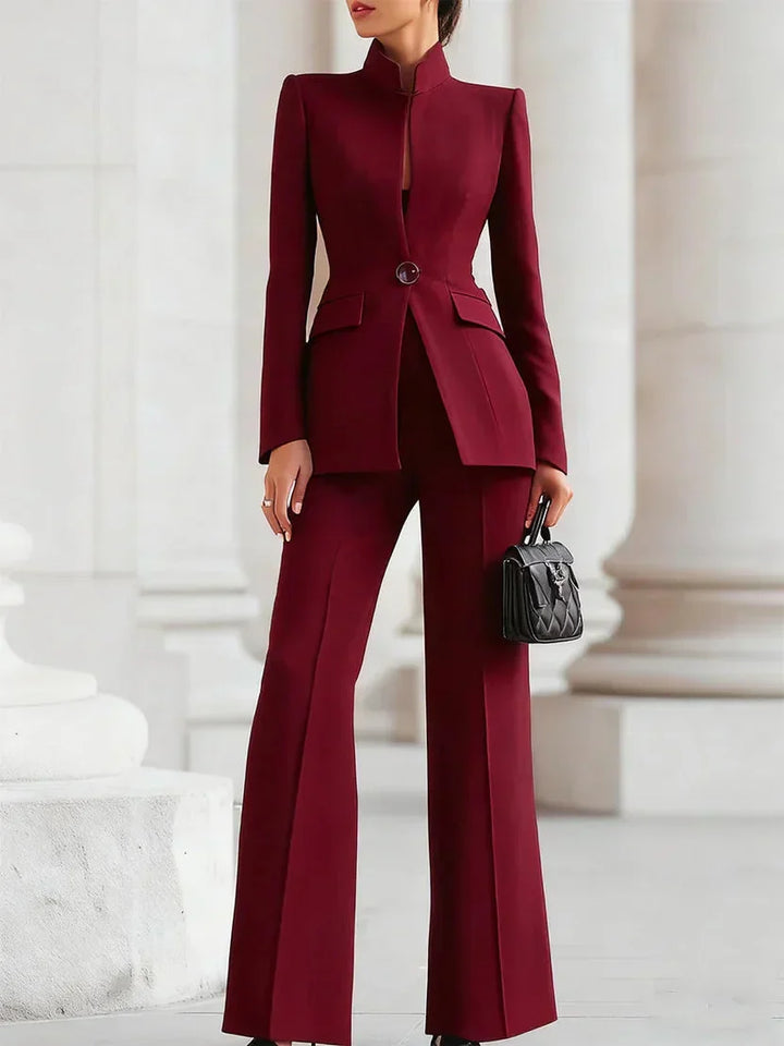 Women's tailored denim jacket & flare trousers set, modeled for a fashionable, modern two-piece look.
