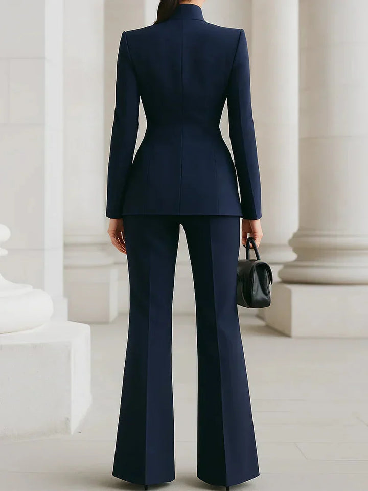 Front view: Women's stand collar tailored denim jacket & flare trousers set. Casual chic jeanswear outfit.