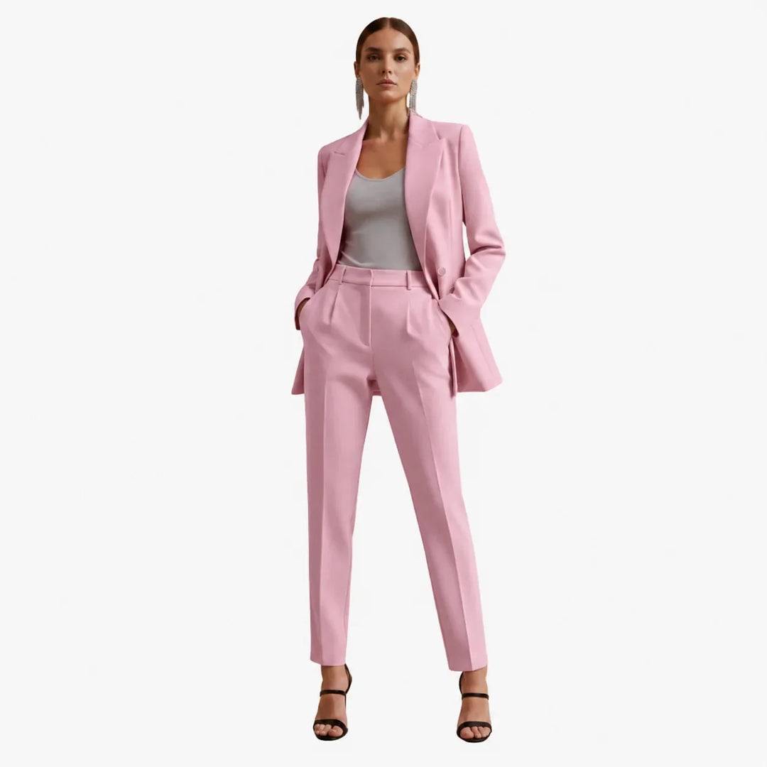 Women's elegant tailored double-breasted blazer and trousers. Perfect for professional office wear.