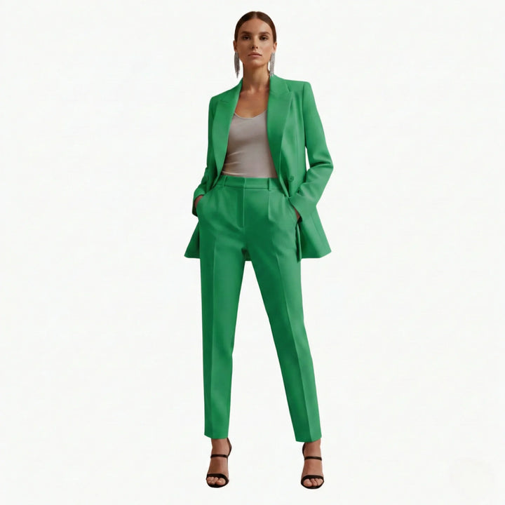 Modern women's double-breasted blazer and trousers set. Tailored for a professional and elegant look.