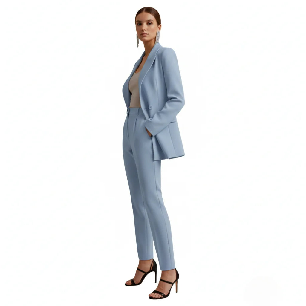 Formal women's business attire: tailored double-breasted blazer and trousers set. Office ready.