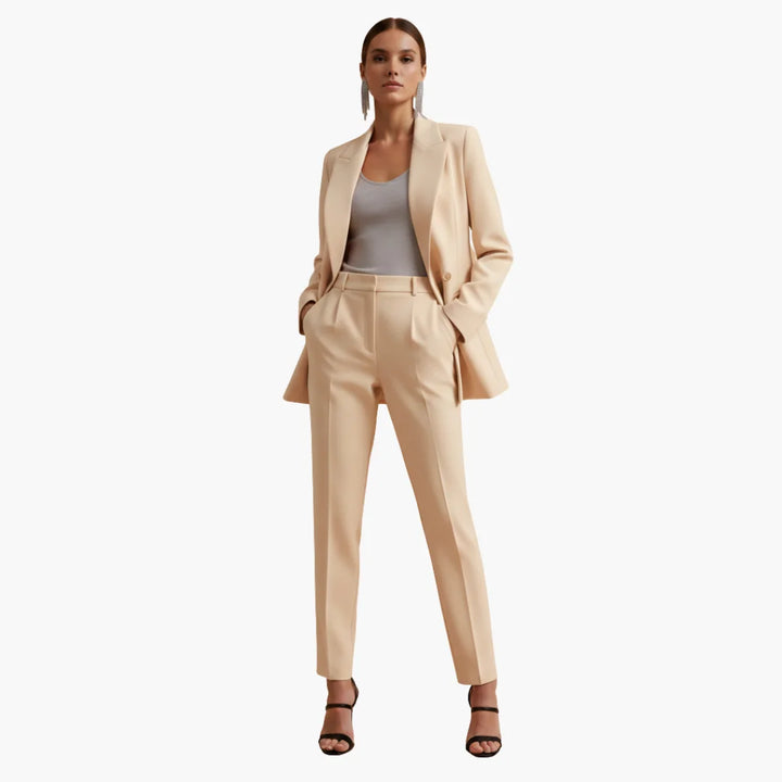 Classic women's double-breasted blazer and trousers set. Tailored for professional office style.