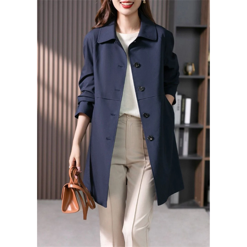 Women's tailored fit trench coat, mid-thigh length. Elegant outerwear perfect for fall and spring fashion.