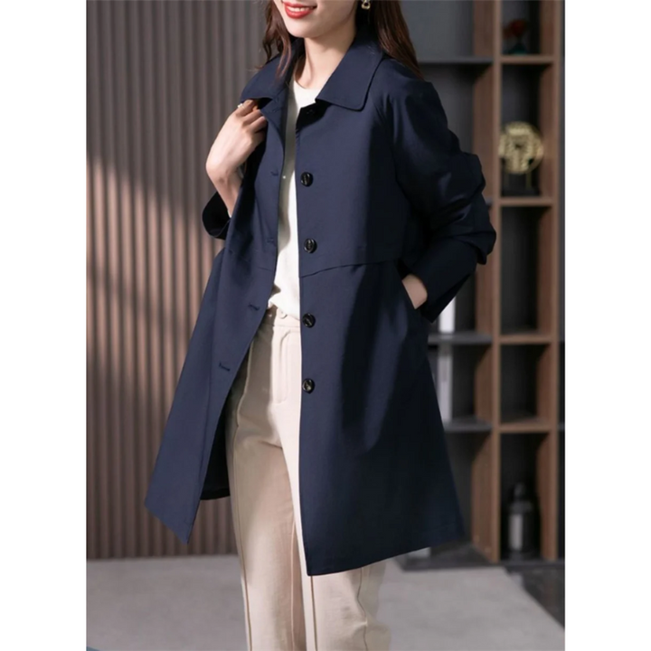 Classic trench coat for women, sophisticated tailored fit. Versatile jacket for elegant spring and fall fashion.