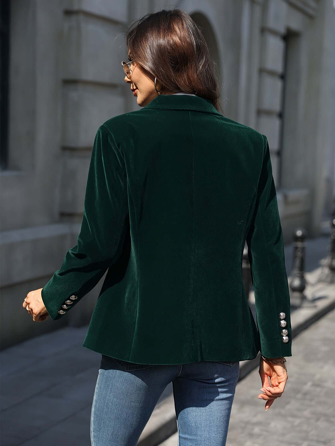 Elegant women's green blazer with golden buttons, perfect for office or special occasions.
