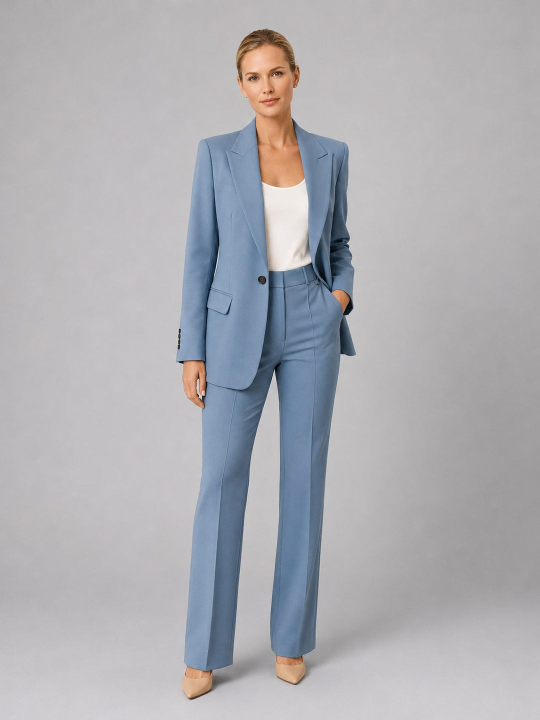 Women's tailored high-waist straight leg suit set. Professional office attire for a chic business formal look.