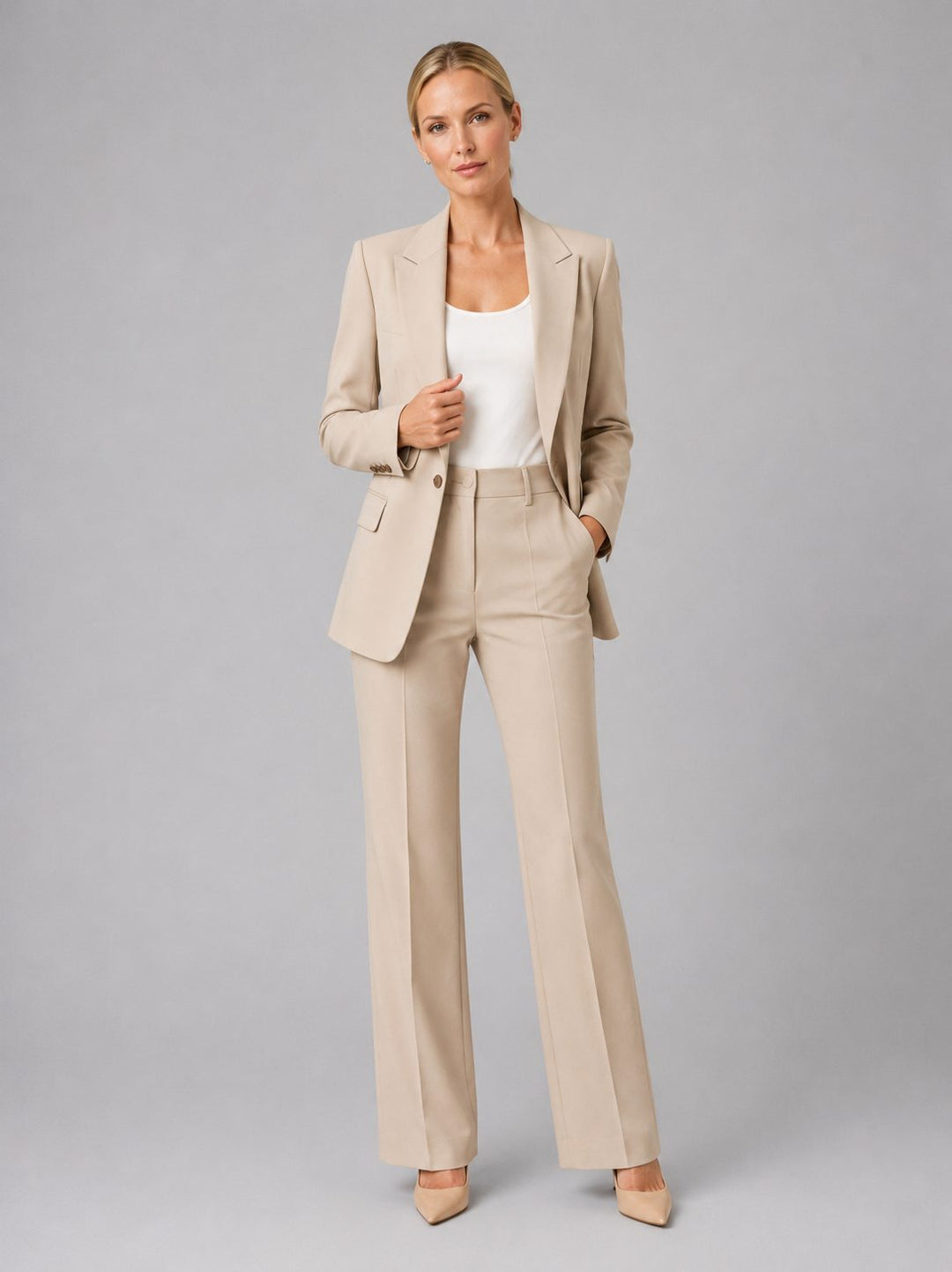 Modern women's tailored power suit with a high-waist straight leg design. Ideal for elegant business formal.