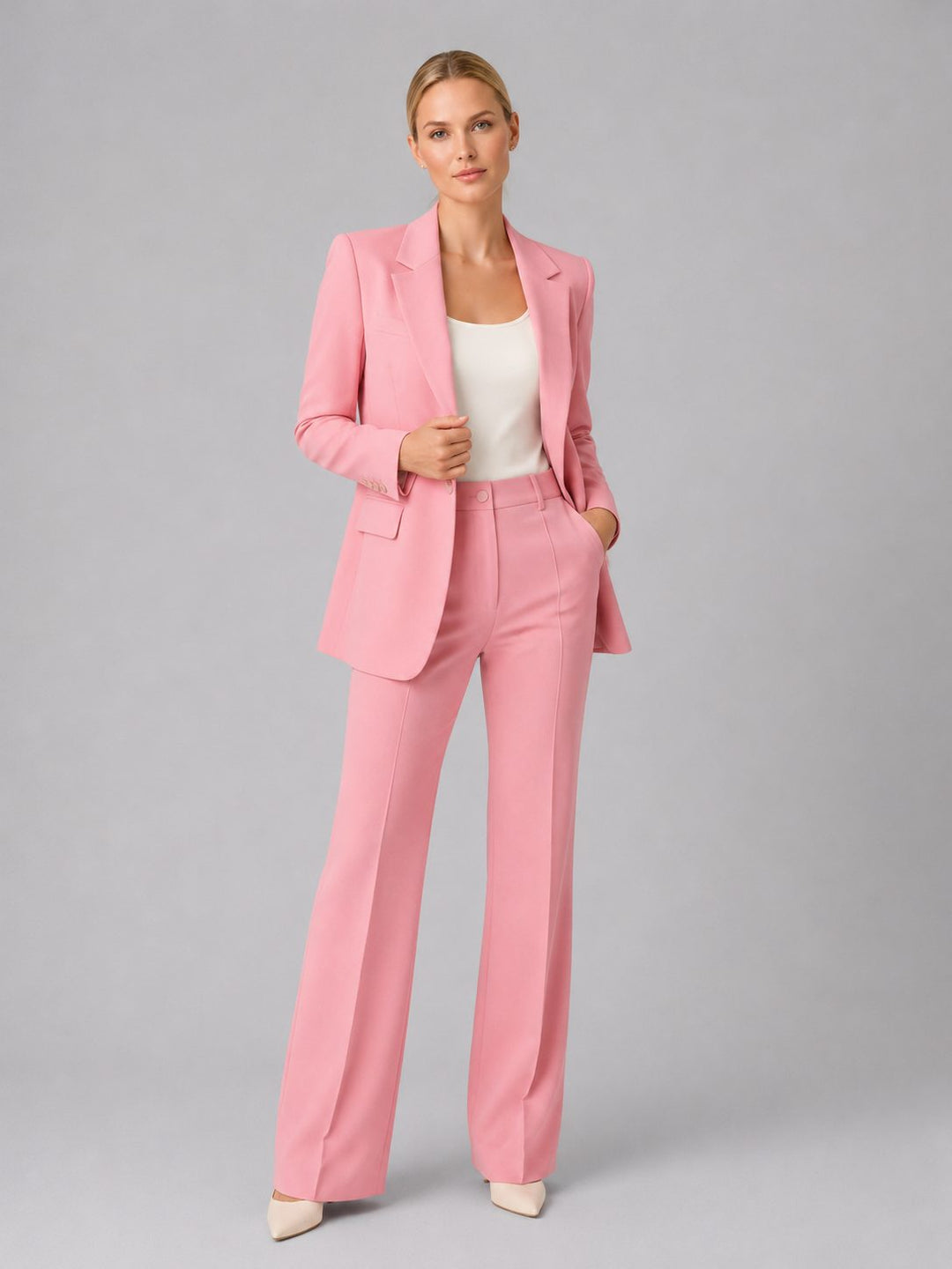 Business formal women's tailored suit. High-waist straight leg blazer & pants for a powerful, professional ensemble.