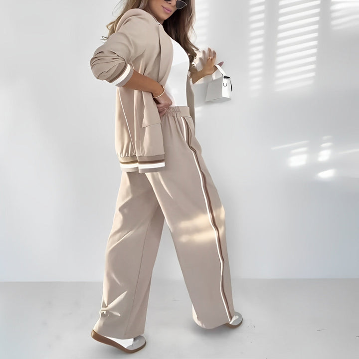 Sophisticated women's tailored lounge set. Chic blazer & straight trousers for professional elegance.
