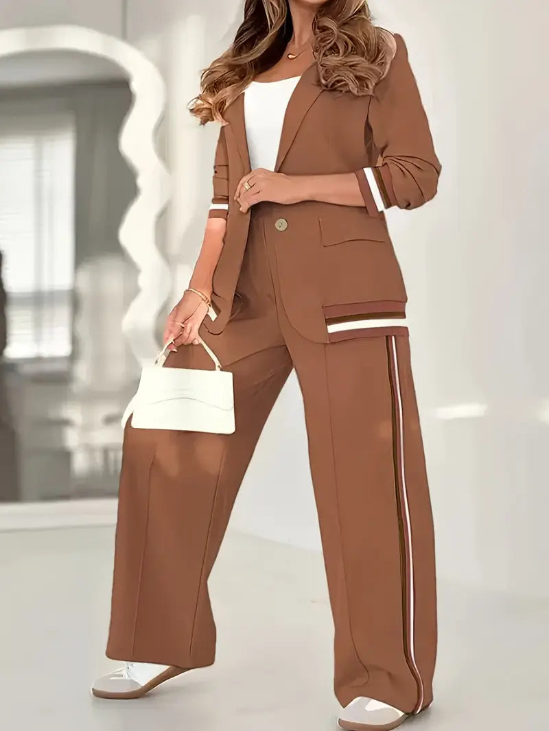 Side view of chic women's tailored lounge set. Professional blazer & straight trousers for versatile style.