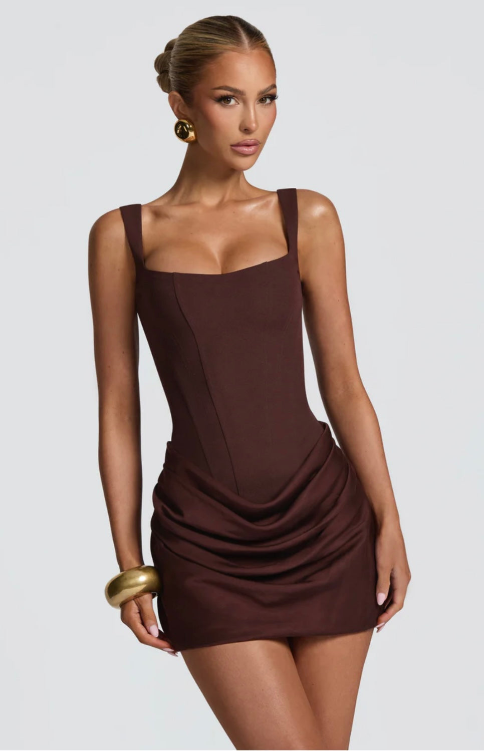 Stylish women's corset mini dress, tailored to perfection. An elegant choice for evening and cocktail events.