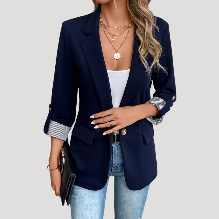 Women's tailored single-breasted blazer with roll-up sleeves. Ideal for business casual & summer office wear.