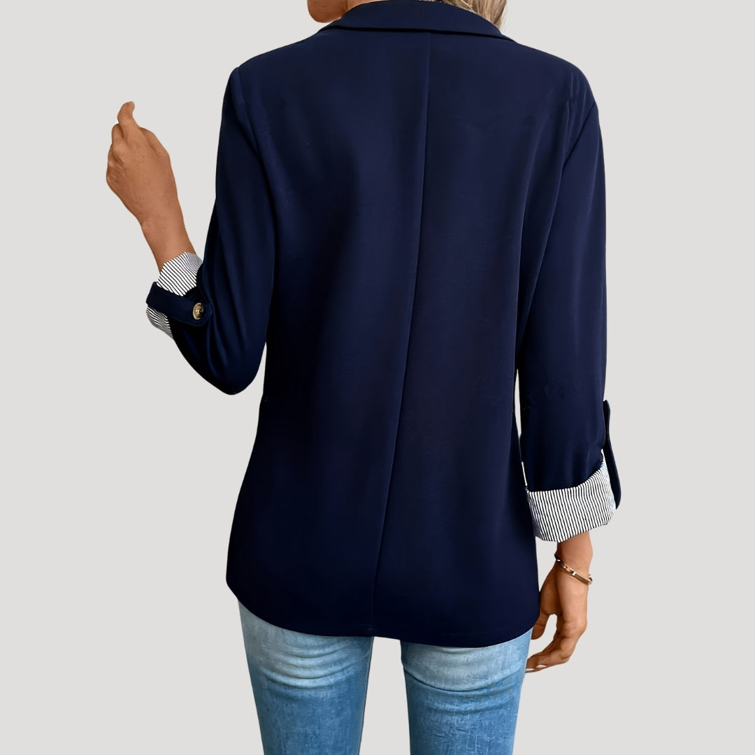 Chic women's tailored blazer with roll-up sleeves. A modern, versatile jacket for business casual or stylish outfits.