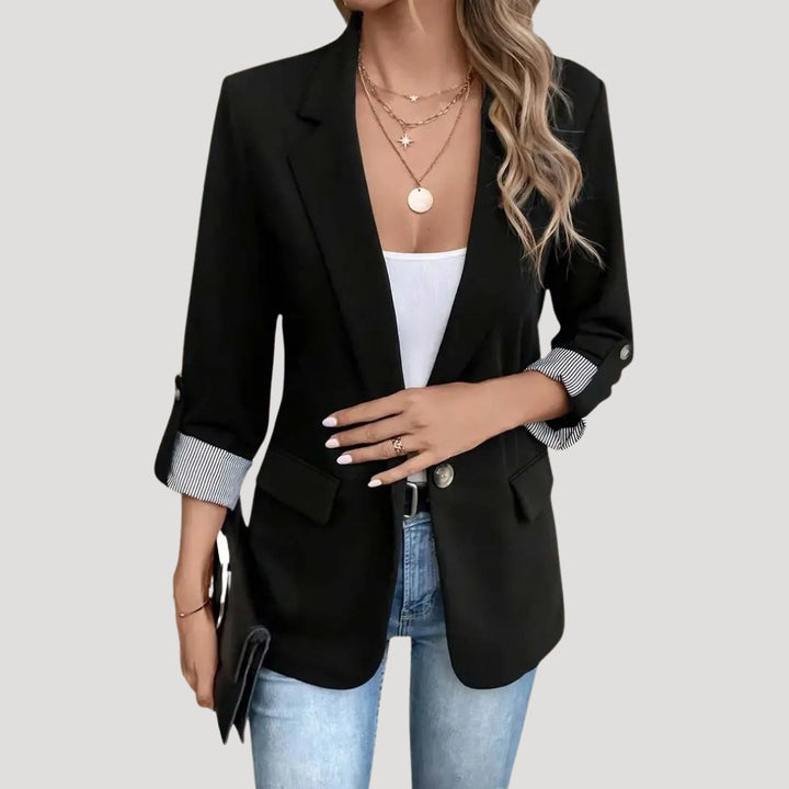 Modern women's tailored blazer, single-breasted design with chic roll-up sleeves. Perfect for versatile office & casual style.