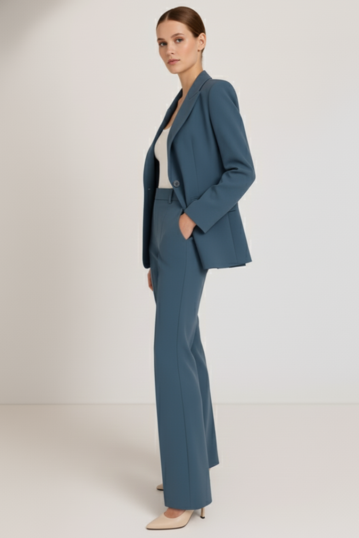 Versatile women's tailored pantsuit: a stylish blazer and trousers perfect for business or formal events.