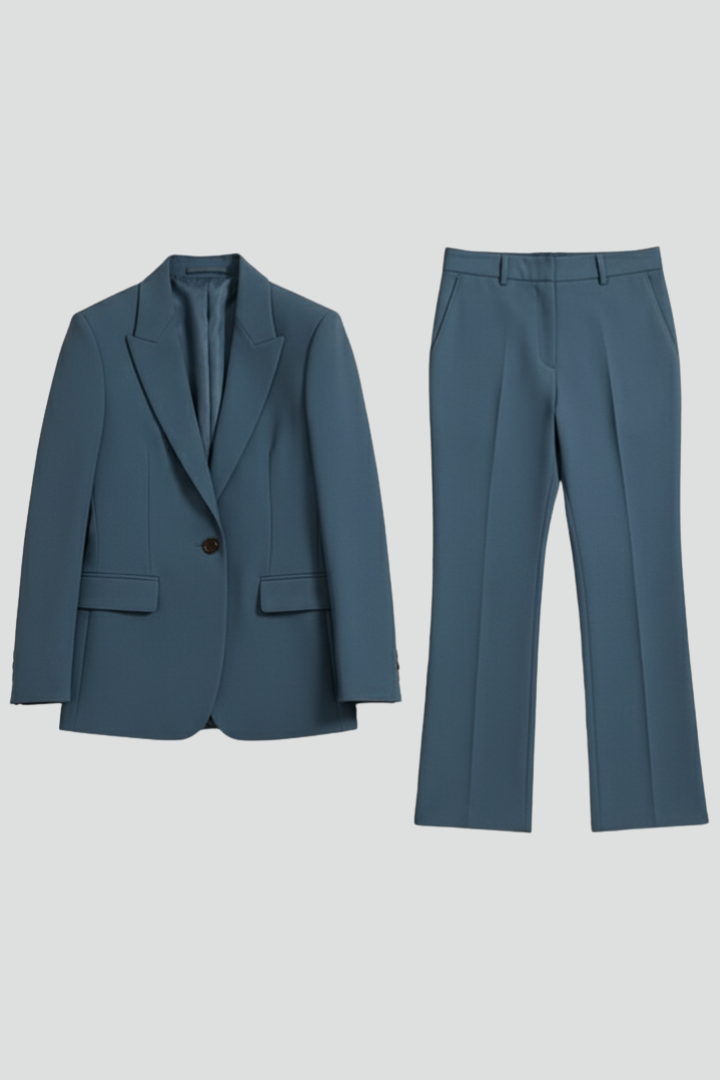 Classic women's tailored pantsuit. A professional two-piece set with a blazer and trousers for workwear.