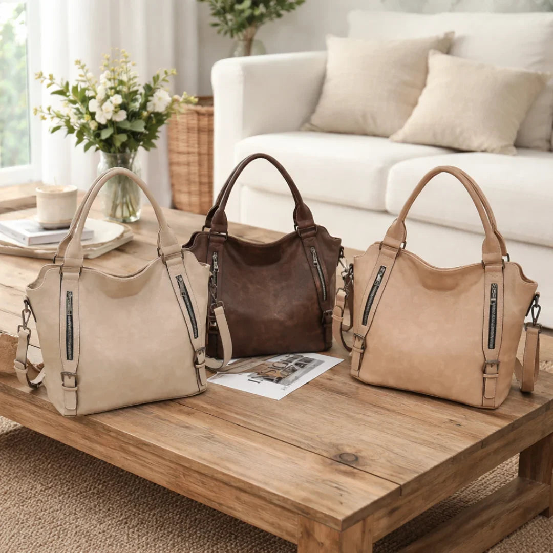 Everyday tan slouchy faux-leather bag for women, secure dual zipper pockets, comfortable adjustable strap.