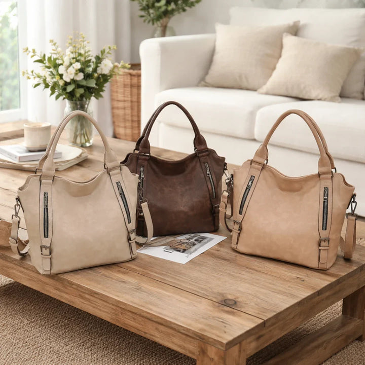 Everyday tan slouchy faux-leather bag for women, secure dual zipper pockets, comfortable adjustable strap.