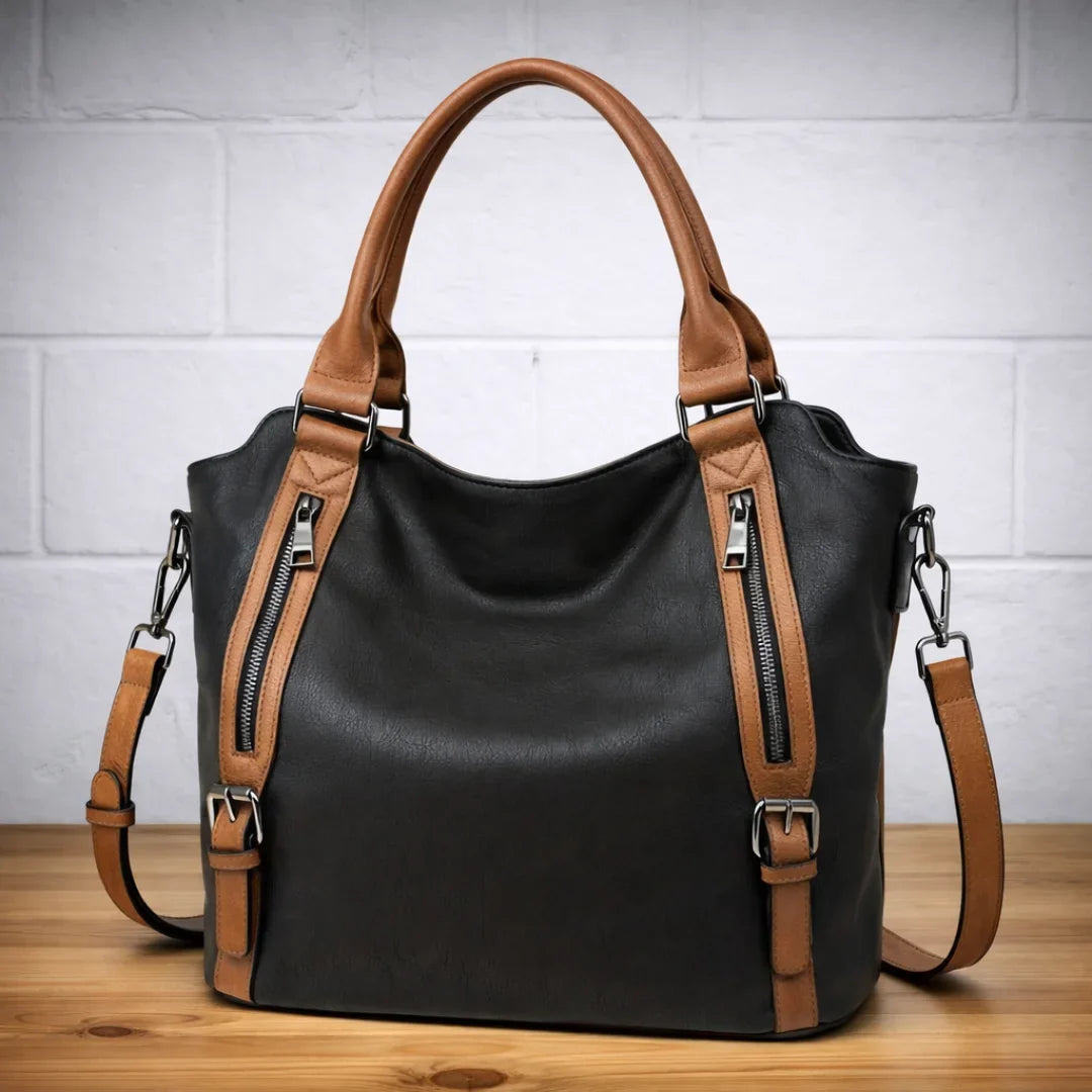 Roomy tan faux-leather slouchy crossbody bag, great for daily essentials with dual zipper pockets.