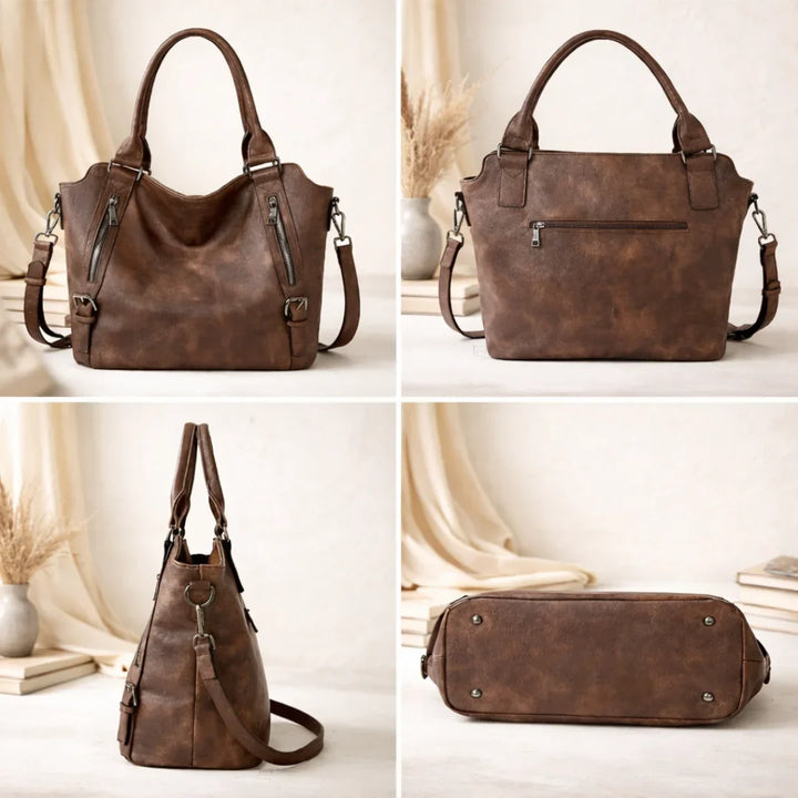 Front view of a tan faux-leather slouchy women's bag, emphasizing dual zipper pockets.