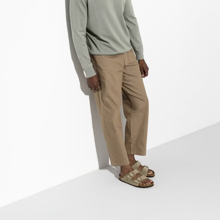 Taupe women's footwear: comfortable sandals with adjustable straps, great for casual summer days.