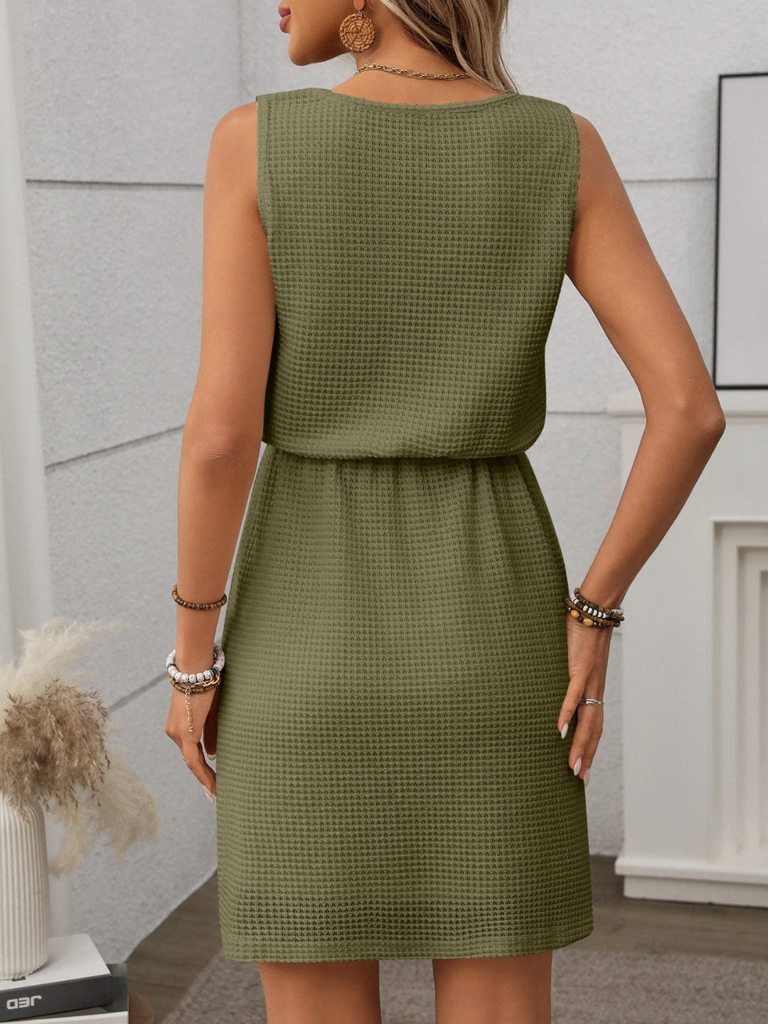 Stylish women's summer tank dress, textured fabric & drawstring create a flattering mini fit.