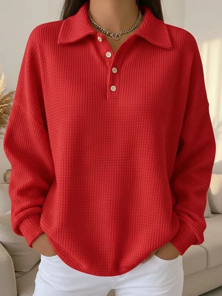 Women's textured knit polo sweater, long-sleeve, featuring an elegant button placket, ideal for autumn & winter fashion.