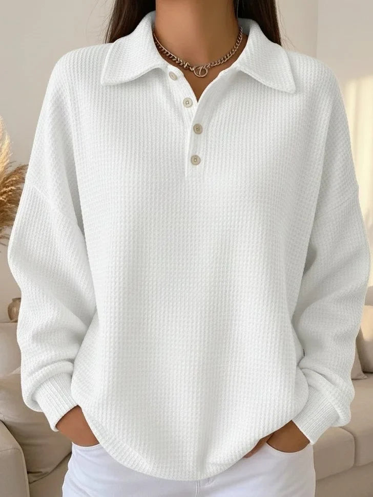 Versatile women's long-sleeve textured knit polo sweater, perfect as an elegant top or casual wear for chilly days.
