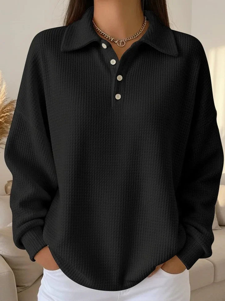 Elegant women's long-sleeve knit polo sweater. Textured fabric, button placket. Perfect for casual or dressy wear.