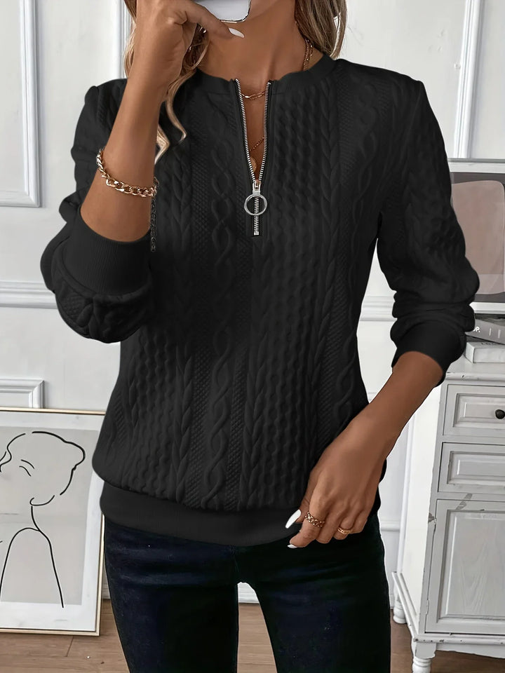 Warm fall/winter women's textured knit quarter-zip sweater, long sleeve, chic design.