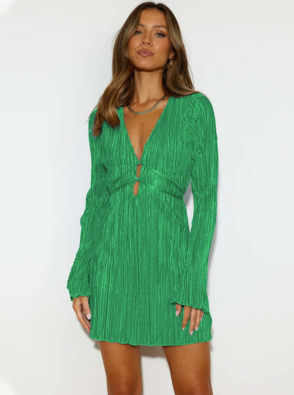 Vibrant green textured mini dress for women with a flattering V-neck and a cute tie back. Summer ready.