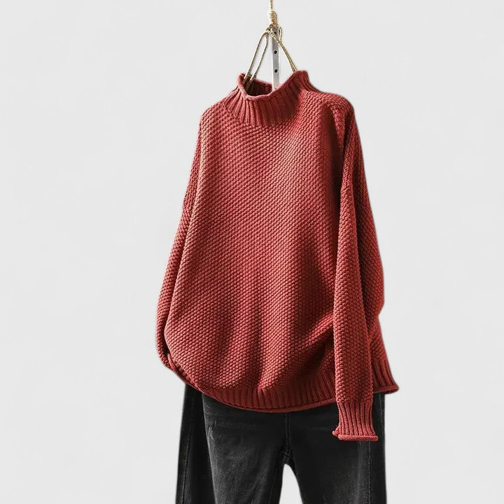 Women's textured mock neck sweater for chic autumn & winter style, cozy & relaxed fit.