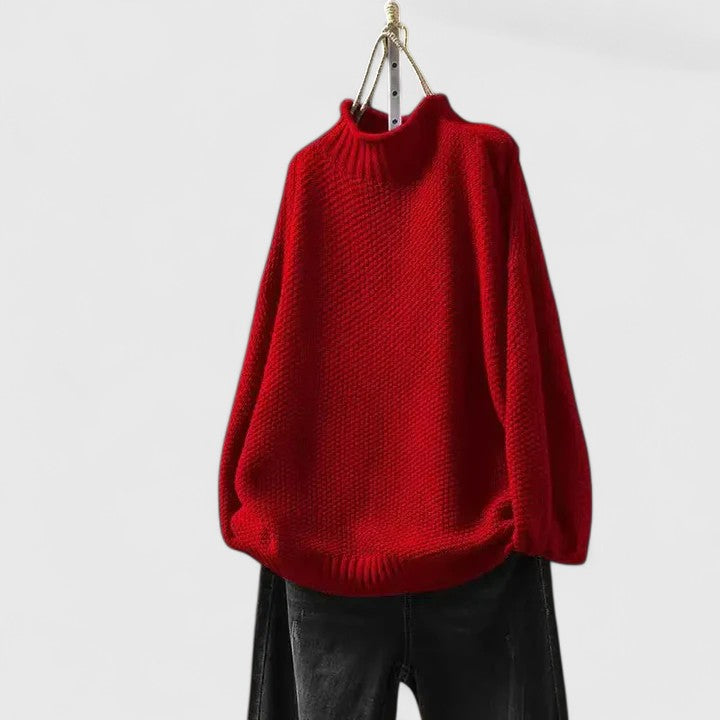 Warm women's textured knit mock neck sweater, perfect for chilly autumn and winter days.